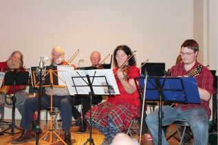 Conductors Cindy McCall and Lukas Reynolds also performed as part of the Lanark Fiddlers Guild. Photo/Craig Bakay